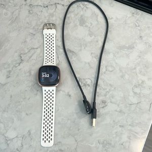 Fitbit versa 4 factory reset with charger cord